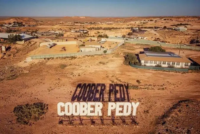 Coober Pedy sign demonstrating the iconic Australian opal mining town landscape