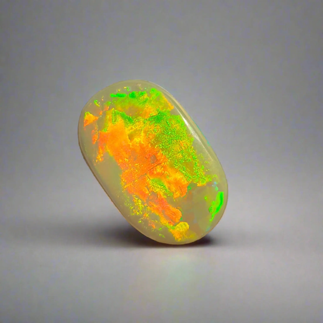 Iridescent Opal Gemstone Displayed in an Article on Identifying Genuine Opals