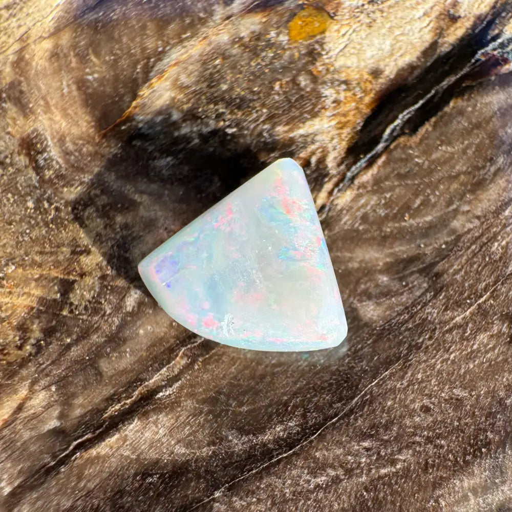 Iridescent triangular Opal cabochon from Lightning Ridge in 1.0 carat hand-cut solid piece