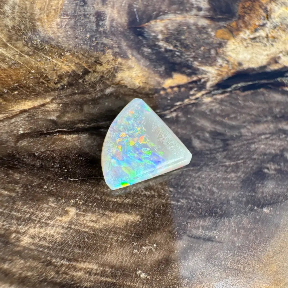 Iridescent triangular 1.0 carat Hand-Cut Solid Lightning Ridge Semi Black Opal gem