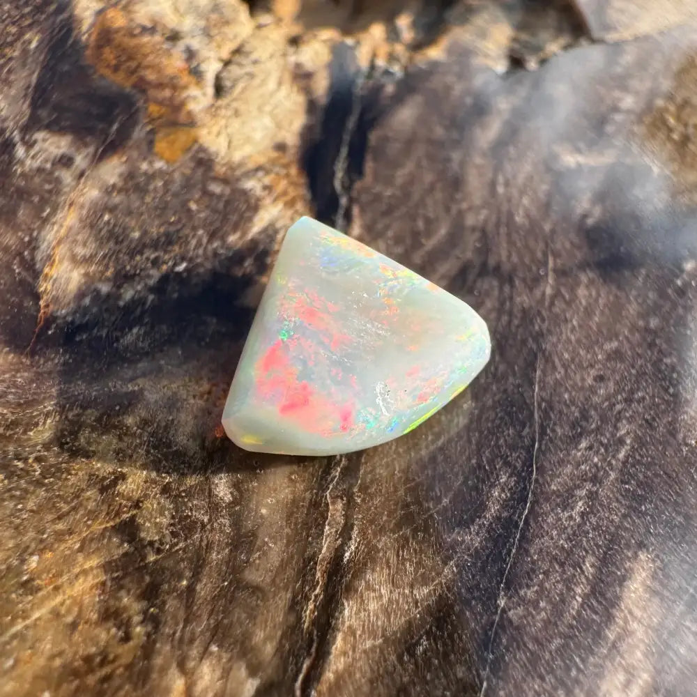 Polished 1.0-carat Hand-Cut Solid Lightning Ridge Semi Black Opal showcasing vibrant color play