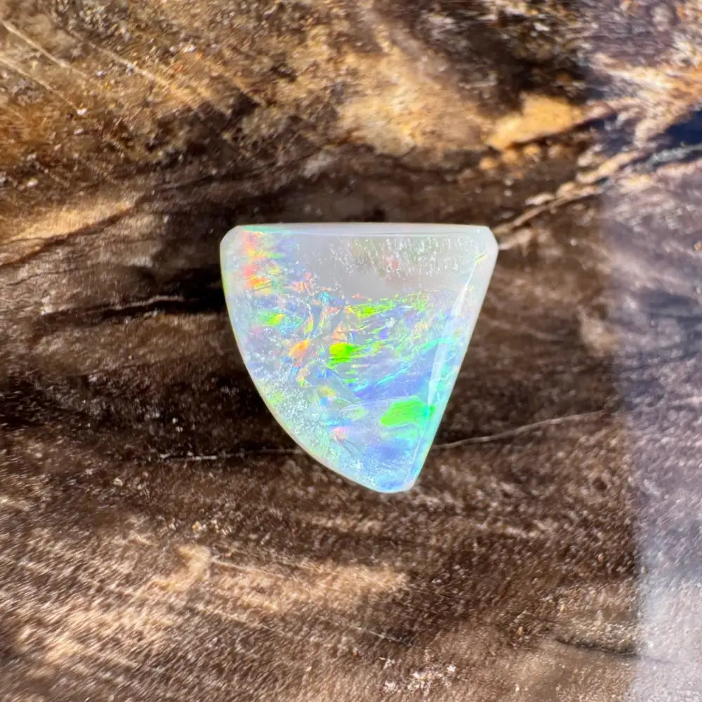 Iridescent triangular opal in 1.0 carat hand-cut solid Lightning Ridge semi black opal