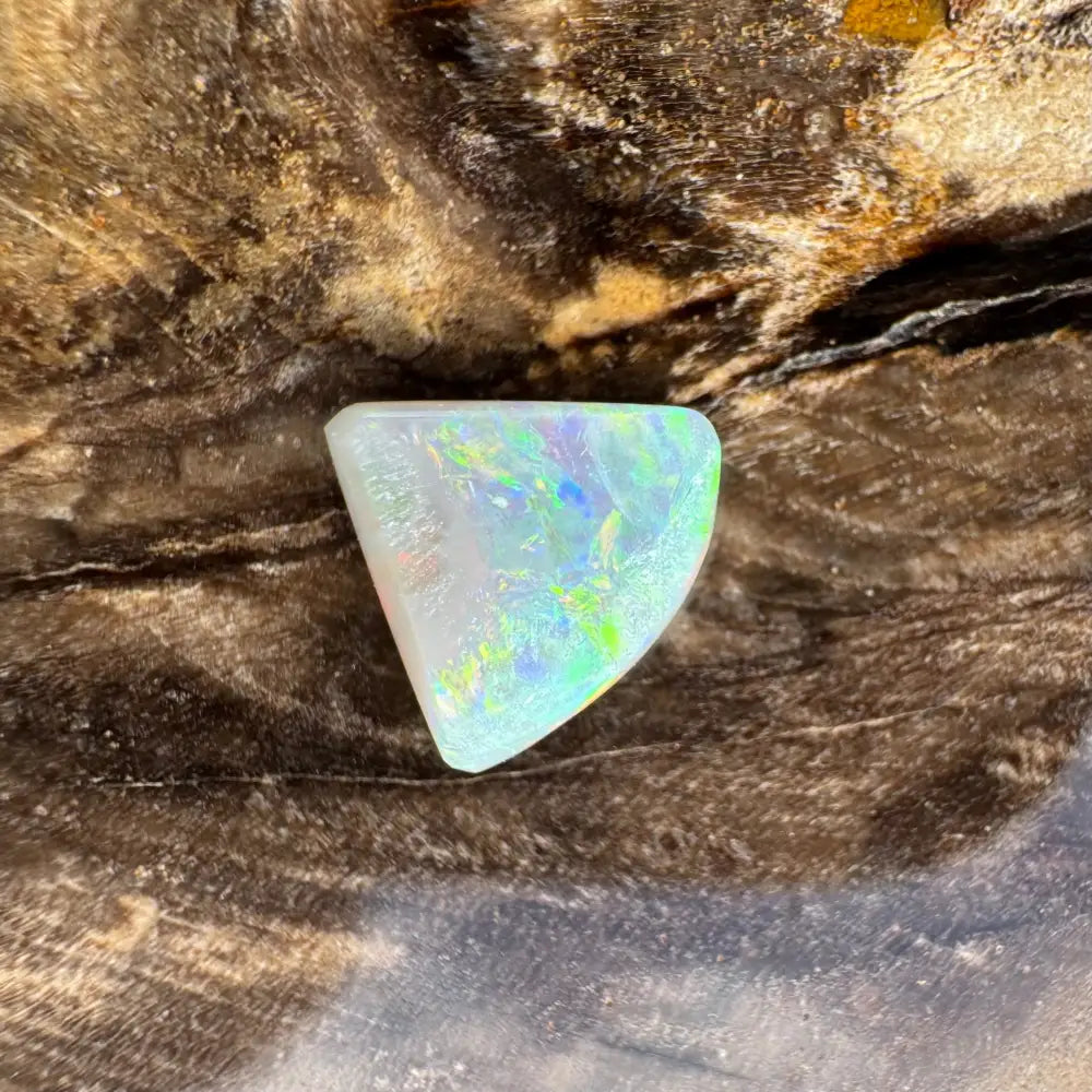Iridescent triangular opal from Lightning Ridge in a 1.0 carat hand-cut solid collection