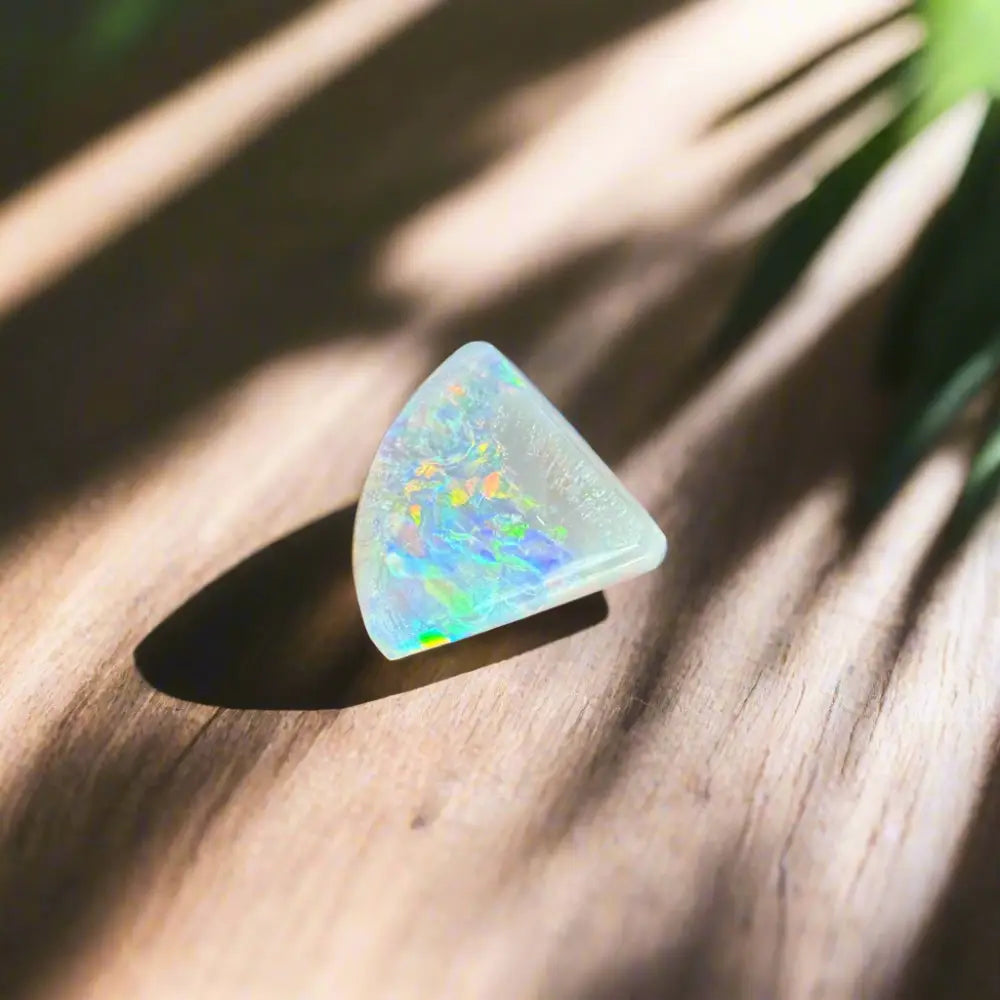 Iridescent triangular opal in 1.0 carat handcrafted Lightning Ridge semi black opal jewelry