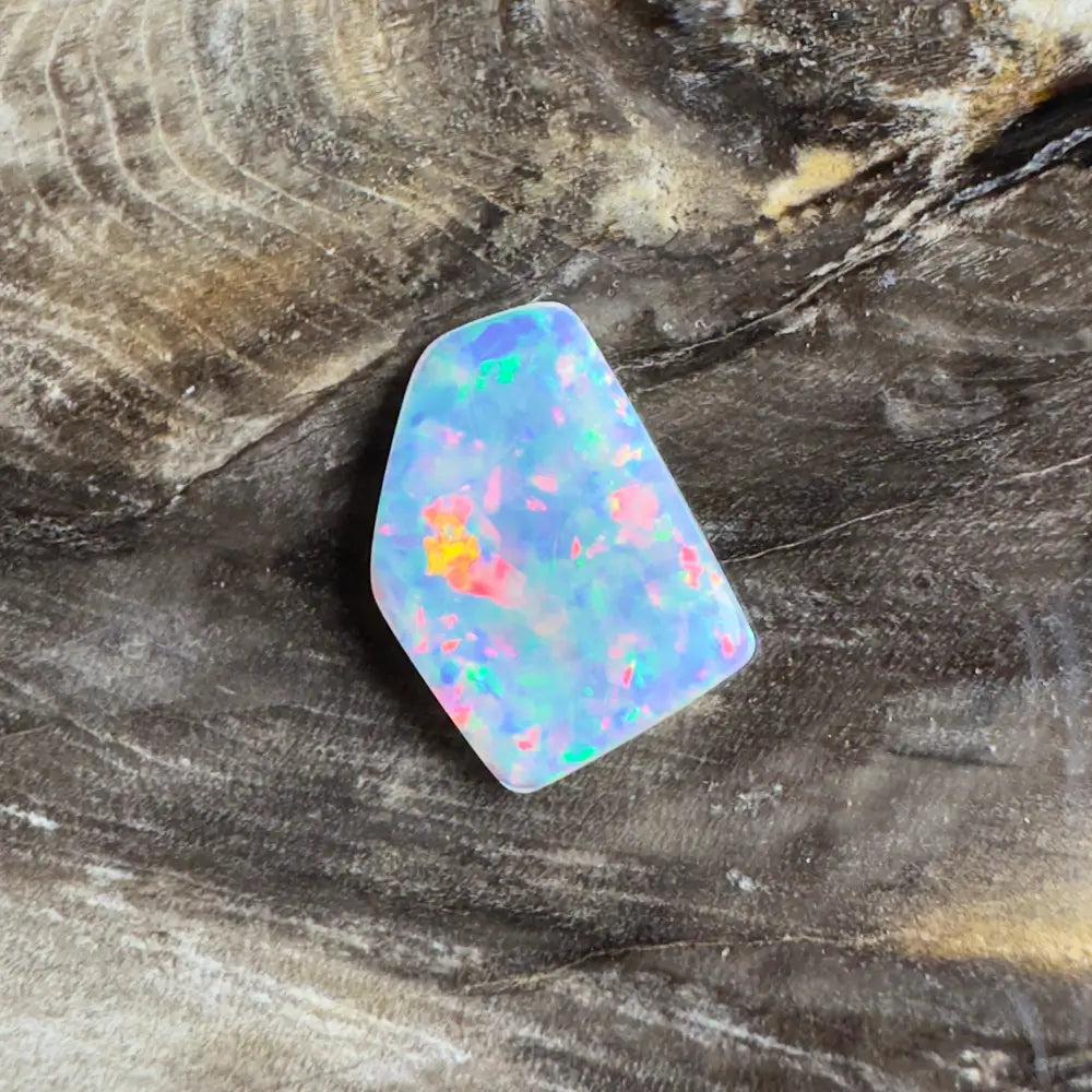 Irregularly shaped opal with vibrant color play.