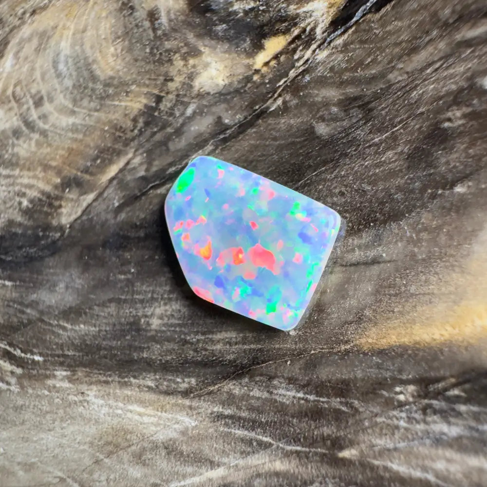 Irregularly shaped opal with vibrant color play.