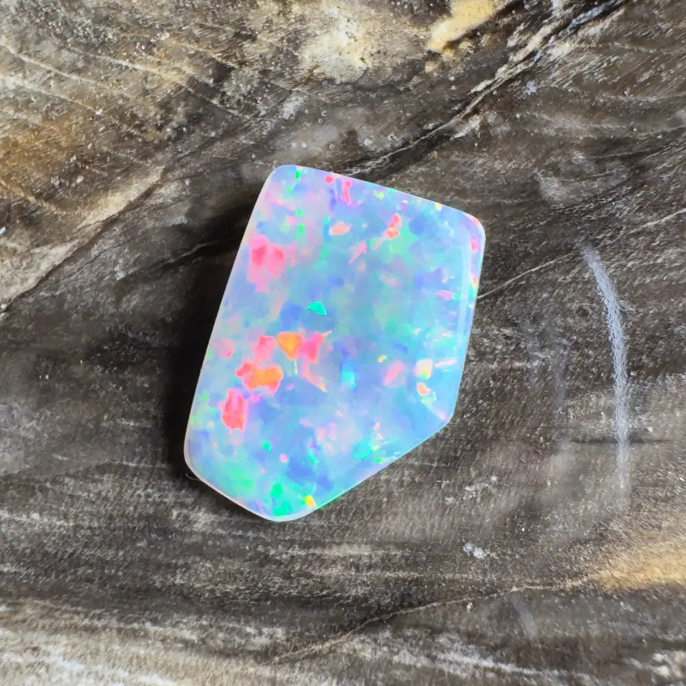Irregularly shaped opal with vibrant color play.