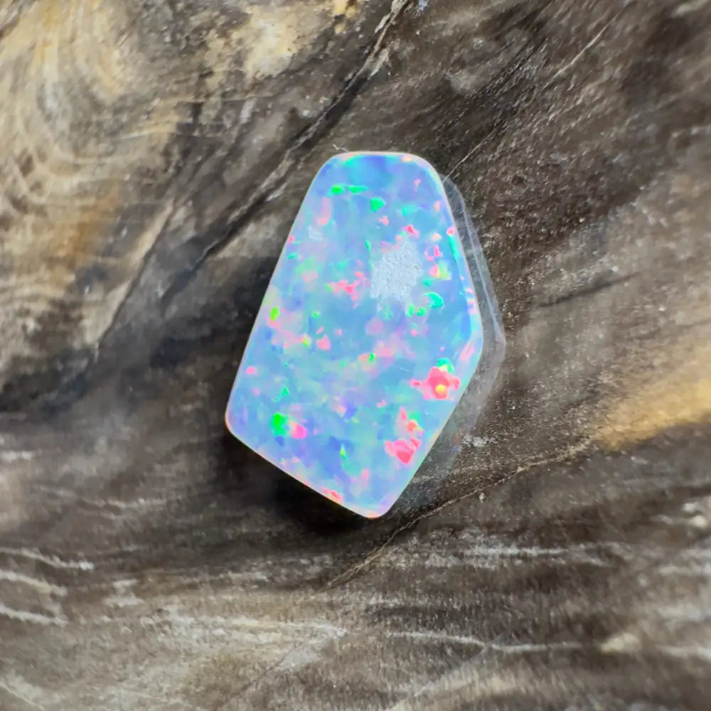 Irregularly shaped opal with vibrant color play.