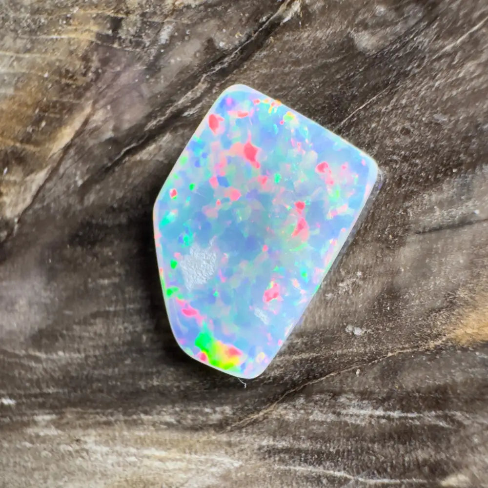 Irregularly shaped opal with vibrant color play.