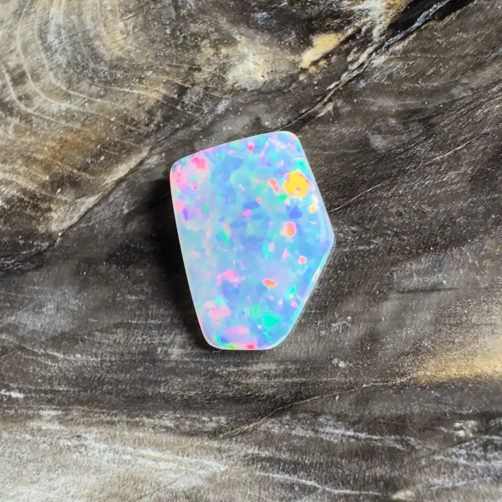 Irregularly shaped opal with vibrant color play.