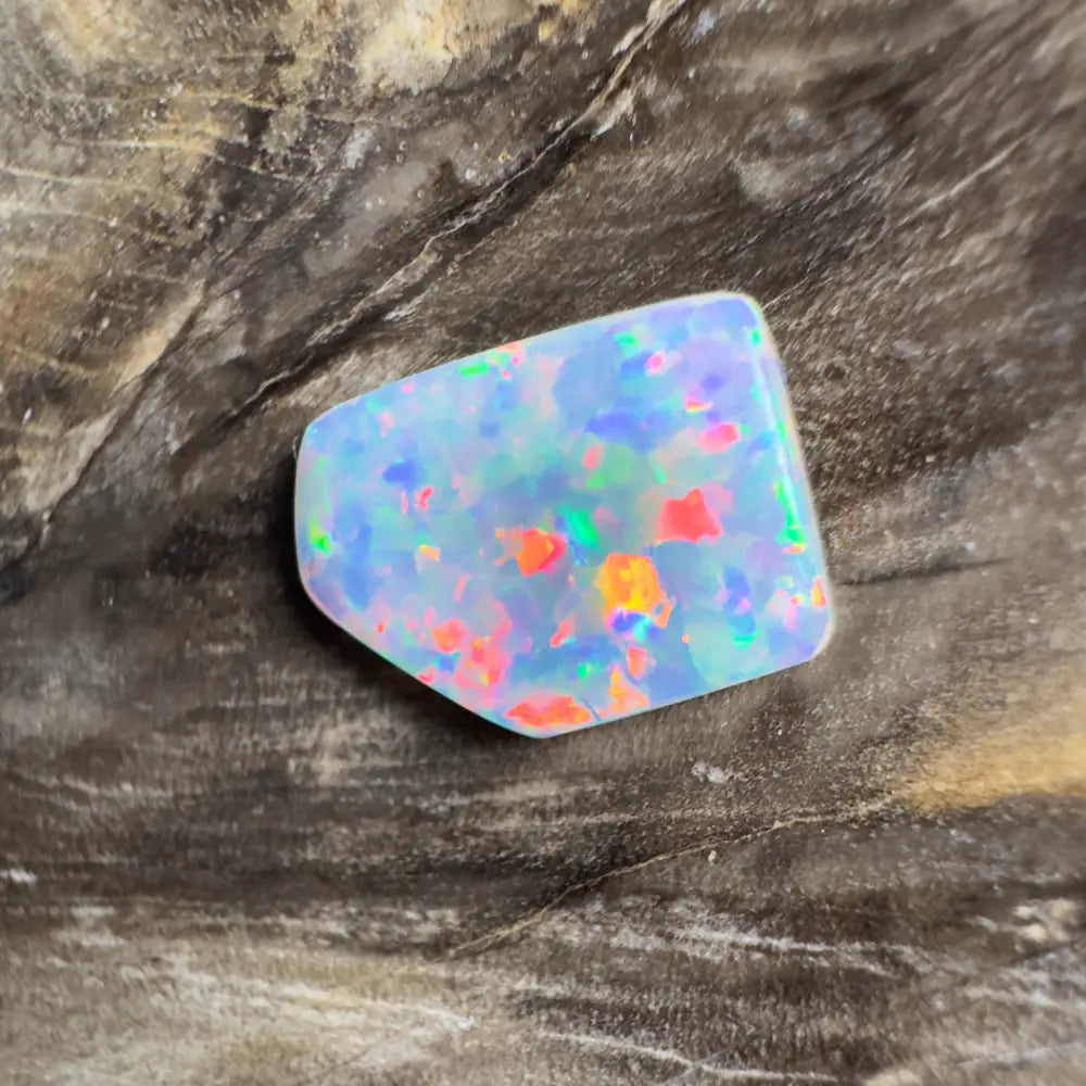 Irregularly shaped opal with vibrant color play.