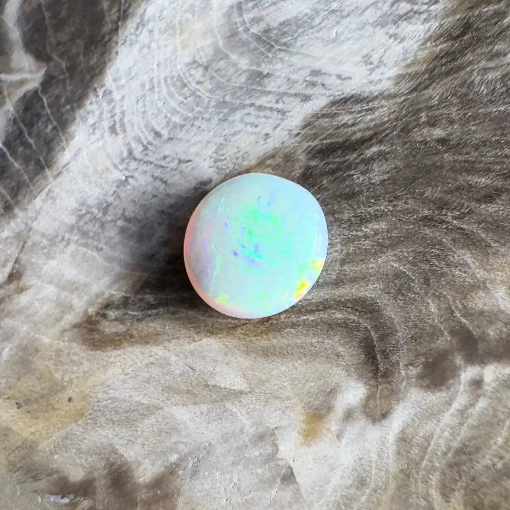Iridescent opal cabochon.