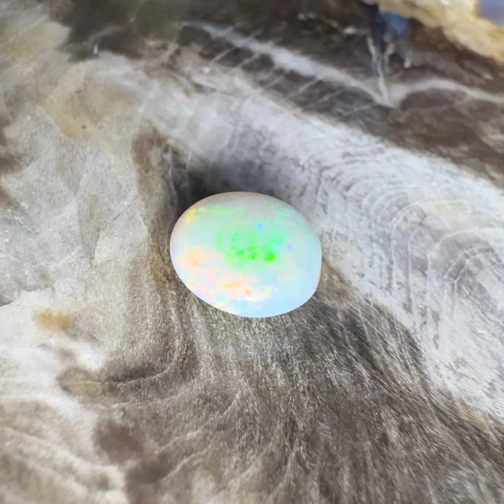 Iridescent opal cabochon.