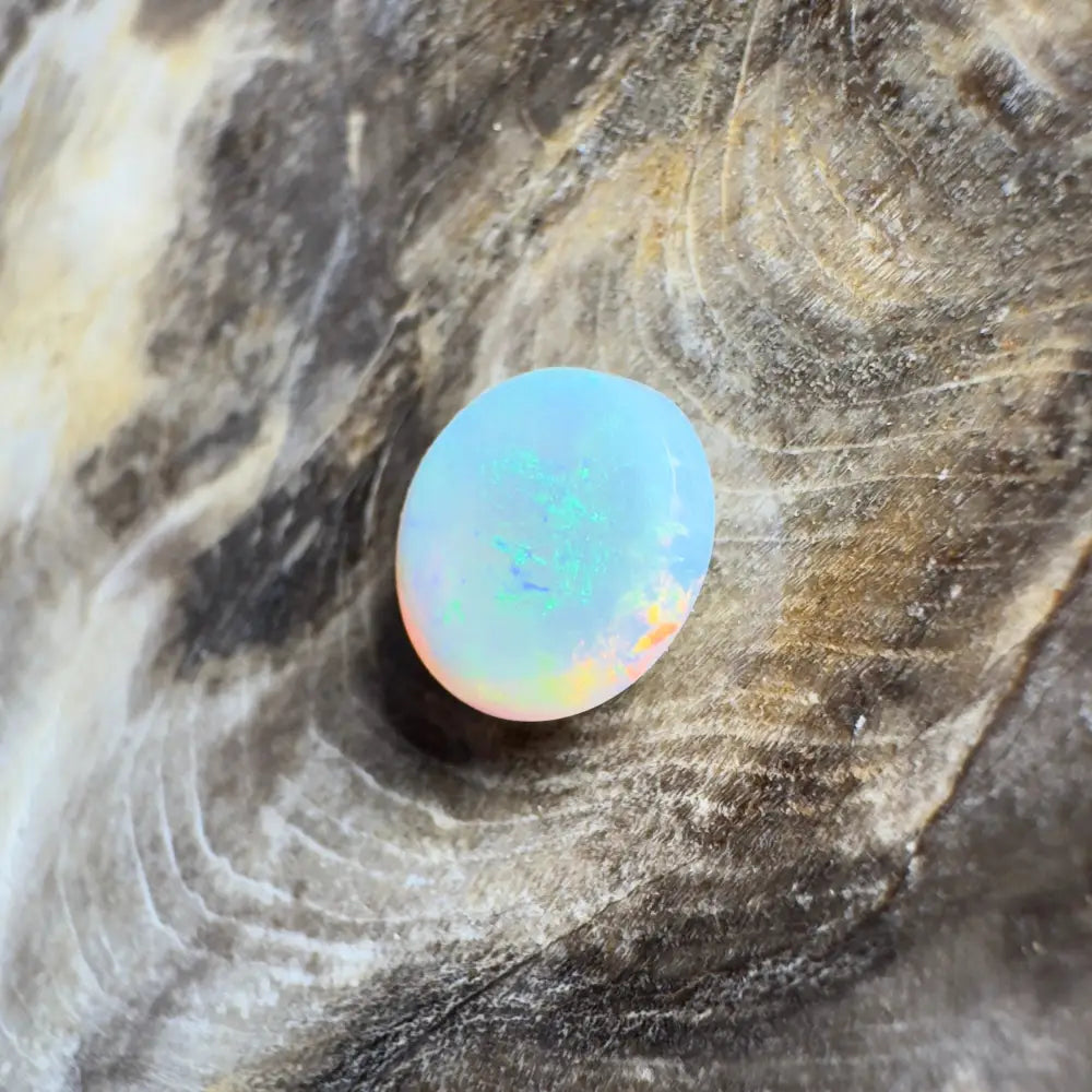 Iridescent oval opal.