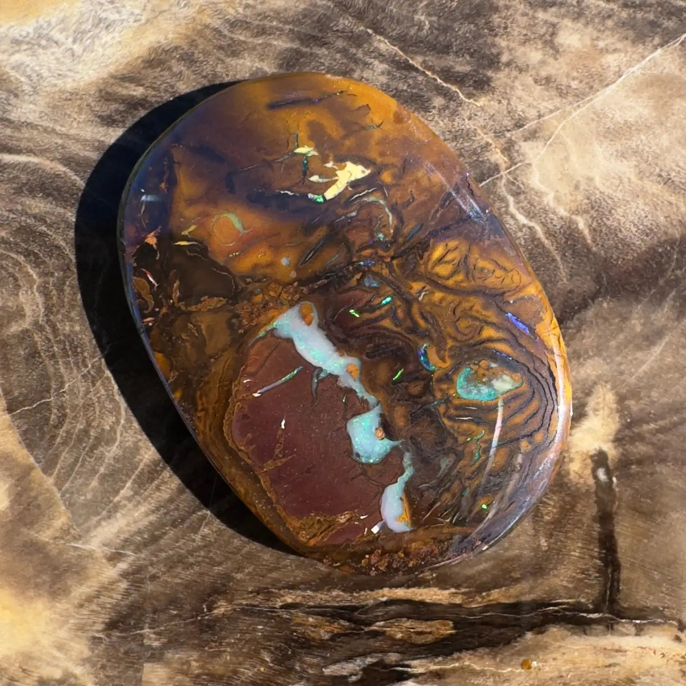 Polished Boulder Opal with brown, gold, and iridescent patterns for 15.9ct Hand-Cut Solid Boulder Opal