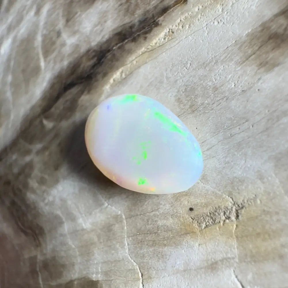 Iridescent white opal gemstone.