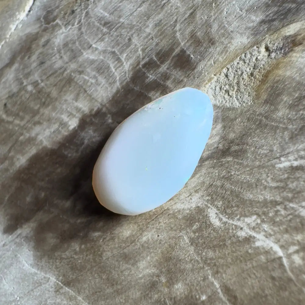 Smooth, pale blue oval stone.
