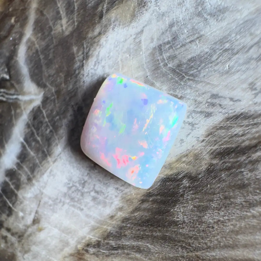 Iridescent white opal gemstone.