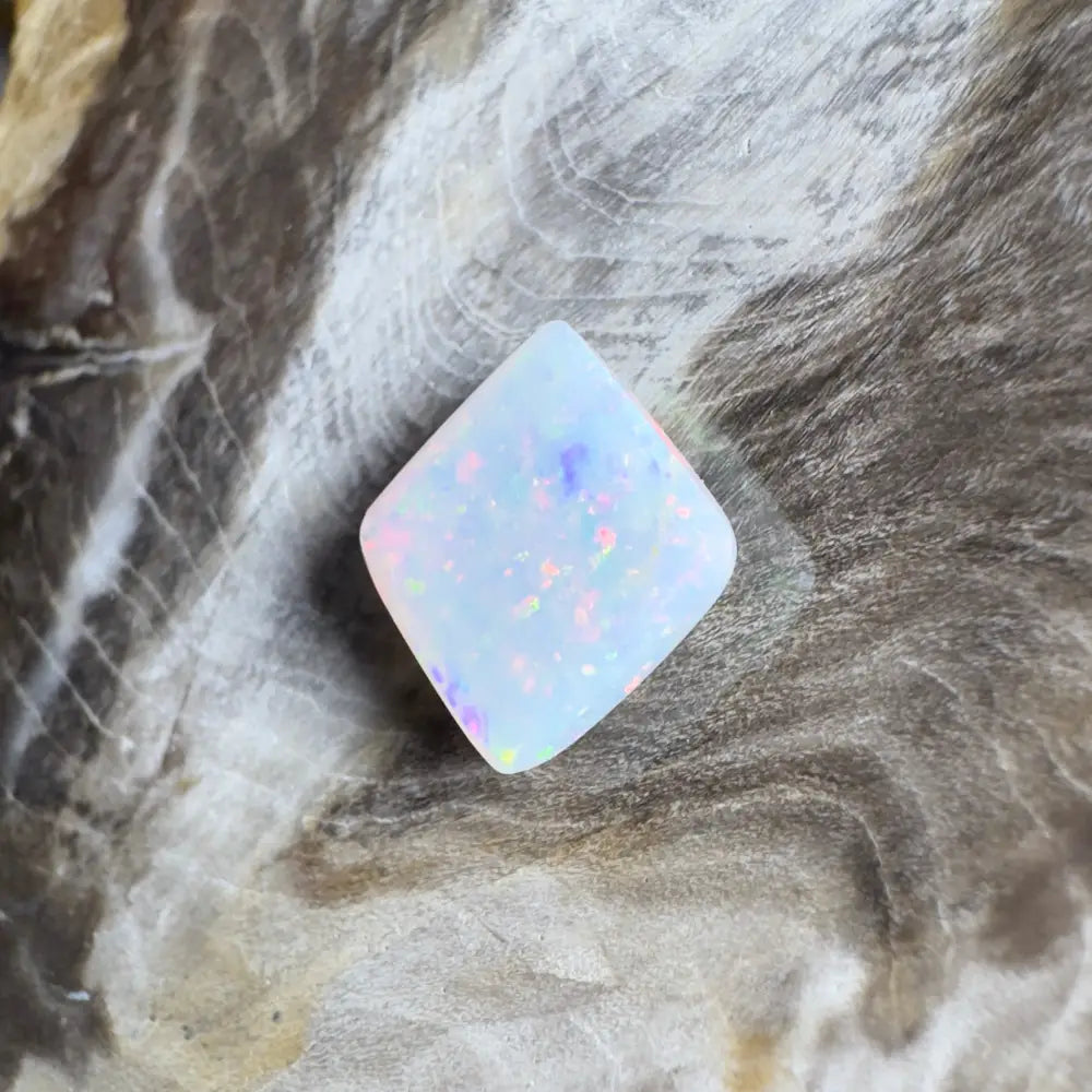 Iridescent white opal gemstone.