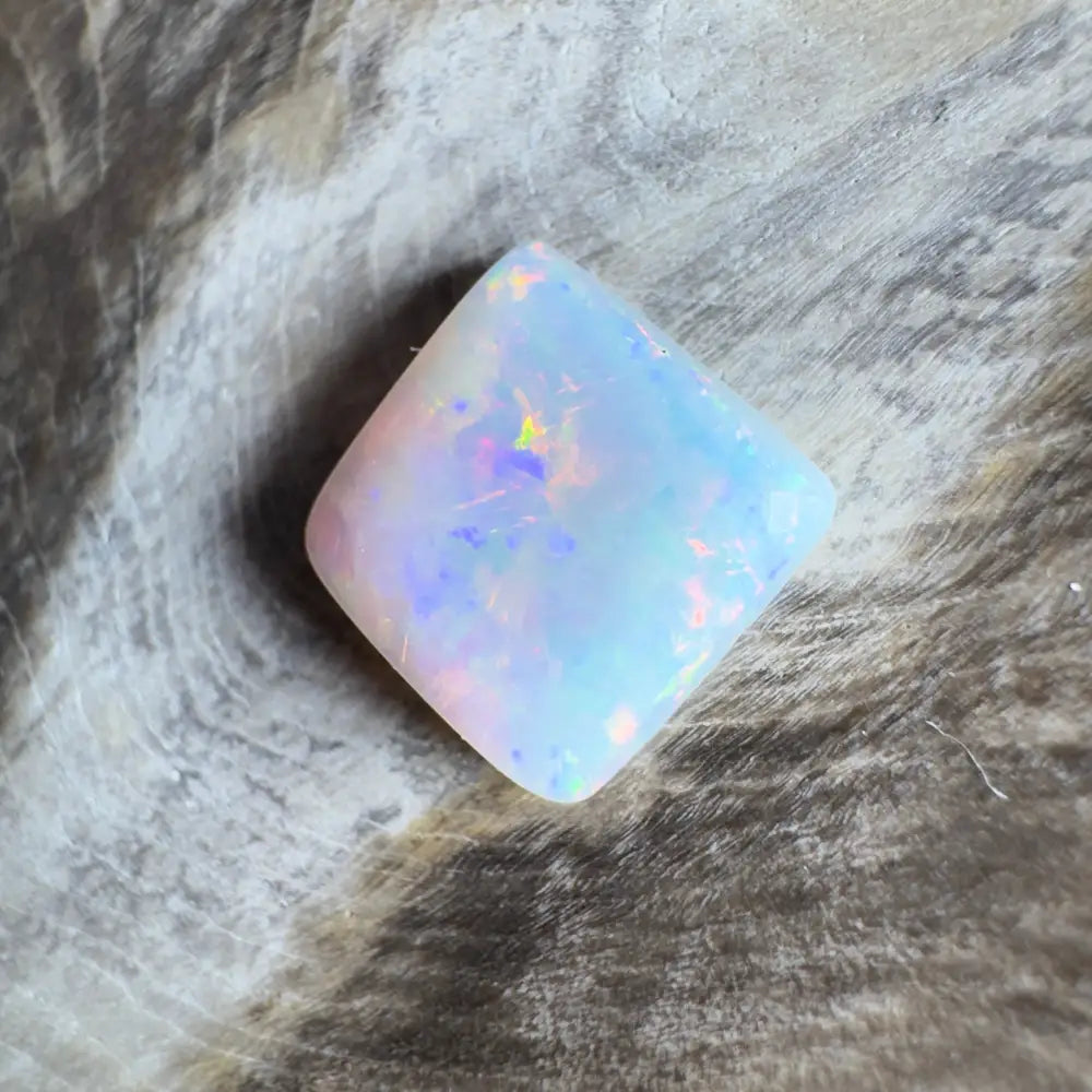 Iridescent white opal gemstone.