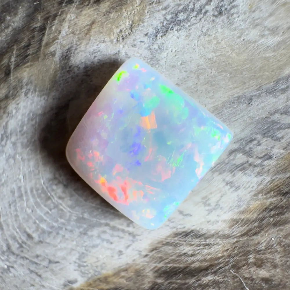 Iridescent white opal gemstone.