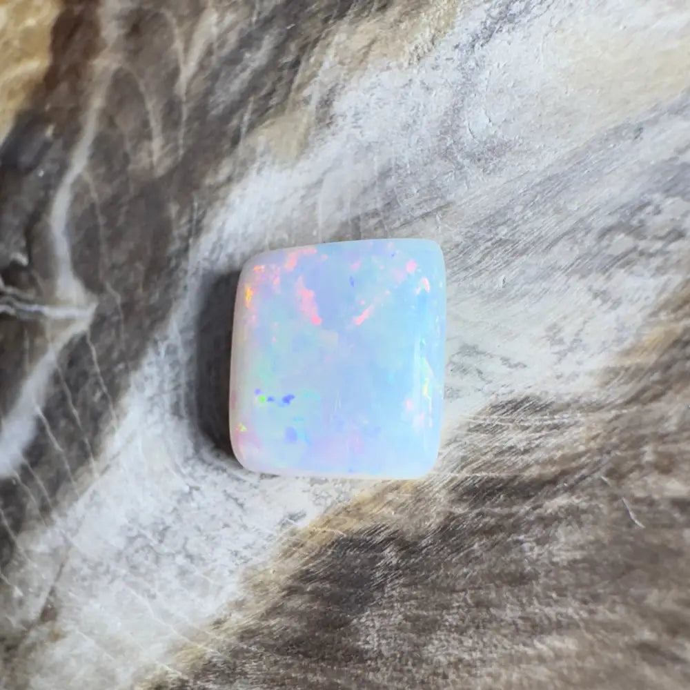 Iridescent white opal gemstone.