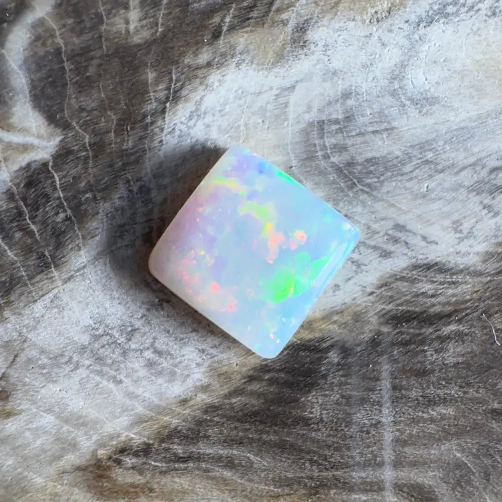 Iridescent white opal gemstone.