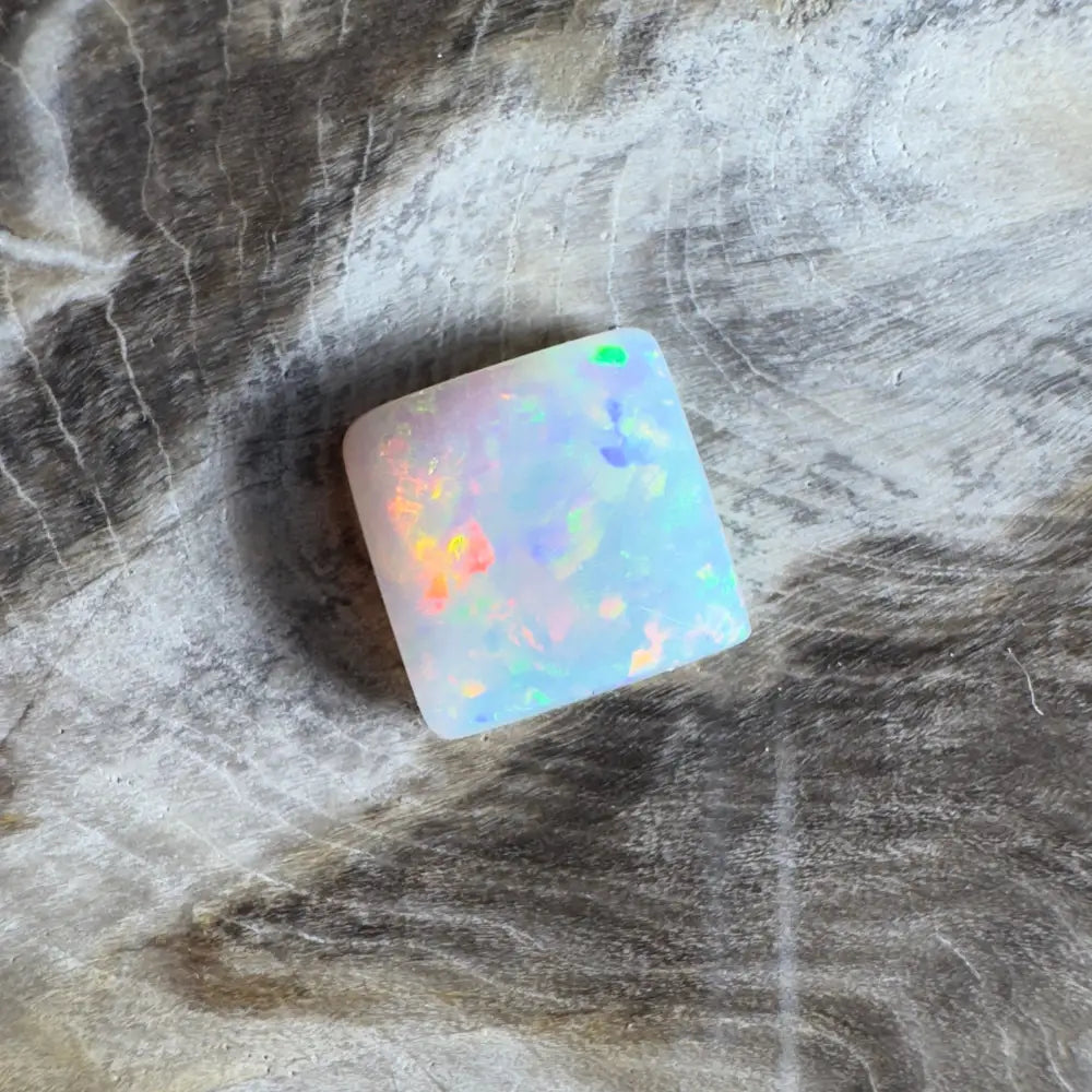 Iridescent white opal gemstone.