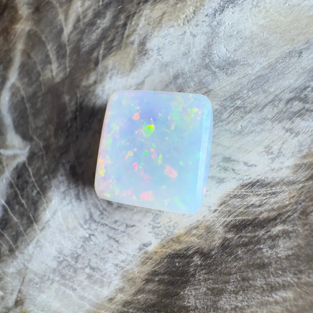 Iridescent white opal gemstone.