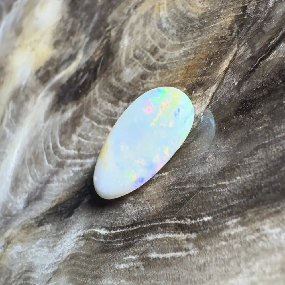 Iridescent, oblong opal.