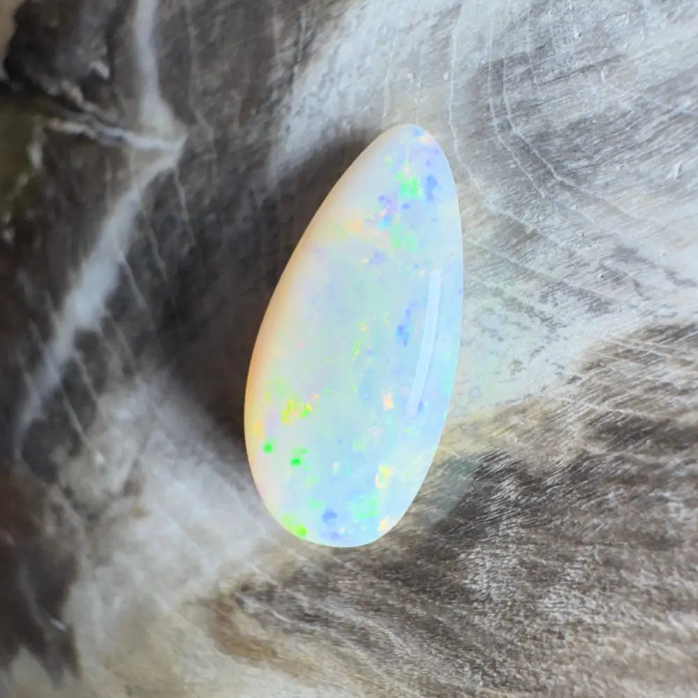 Iridescent teardrop-shaped opal.