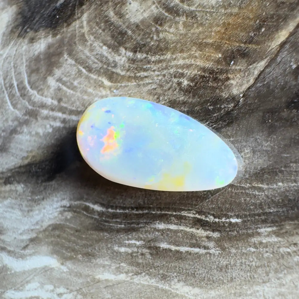 Iridescent teardrop-shaped opal.