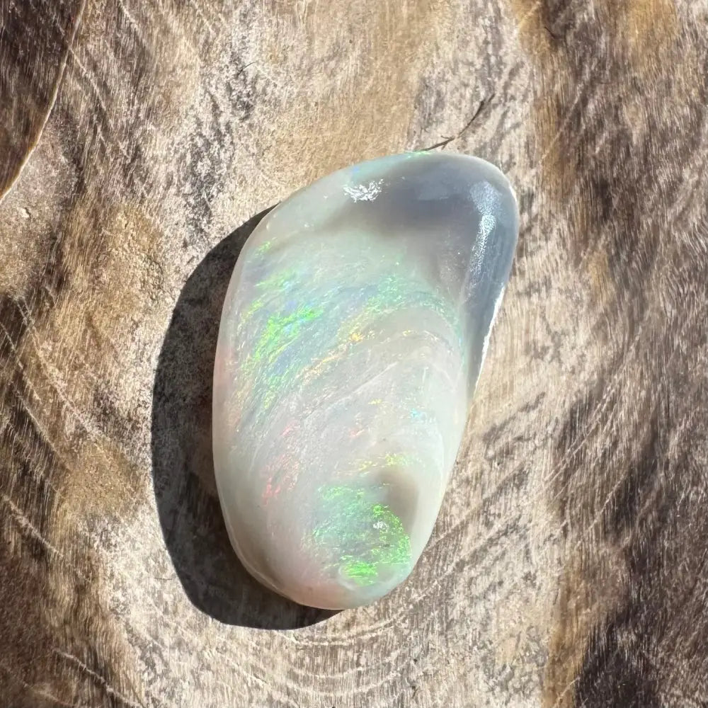 Iridescent white opal.