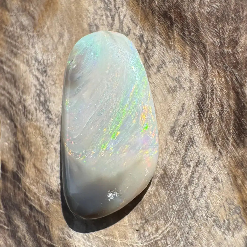 Iridescent white opal gemstone.
