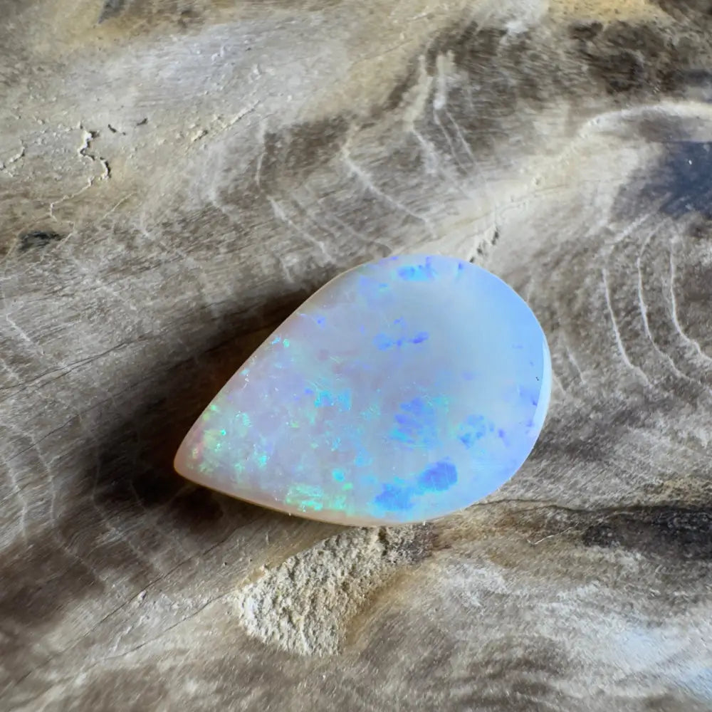 Iridescent teardrop-shaped opal.