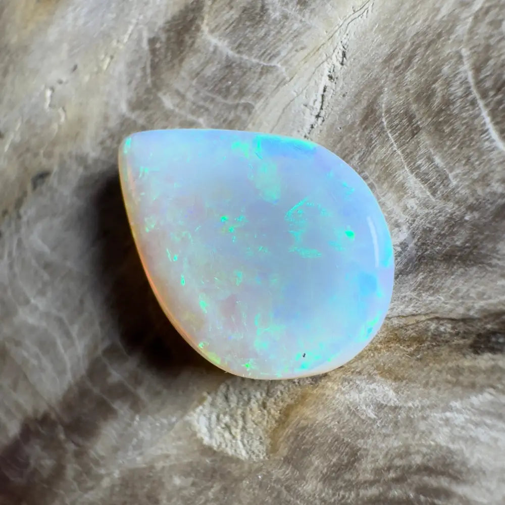 Iridescent teardrop-shaped opal.