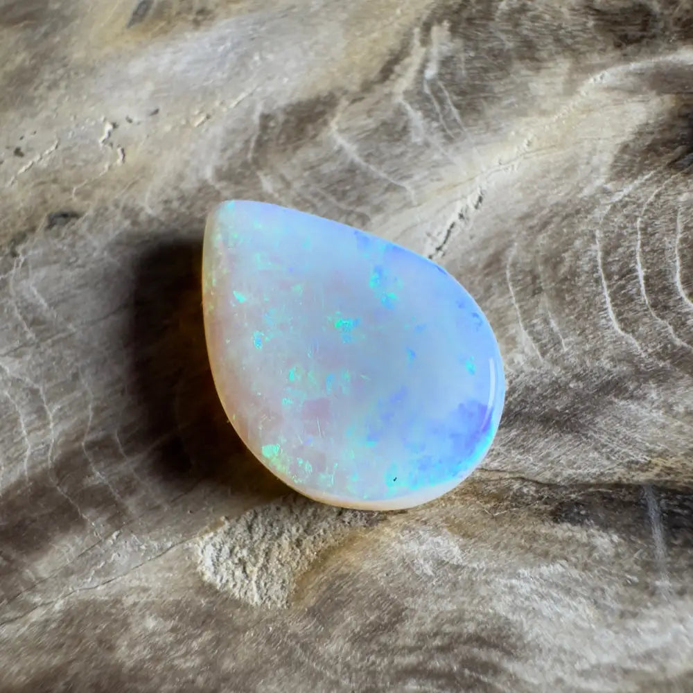 Iridescent teardrop-shaped opal.