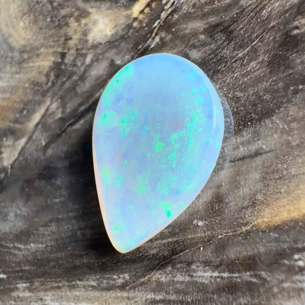 Iridescent teardrop-shaped opal.