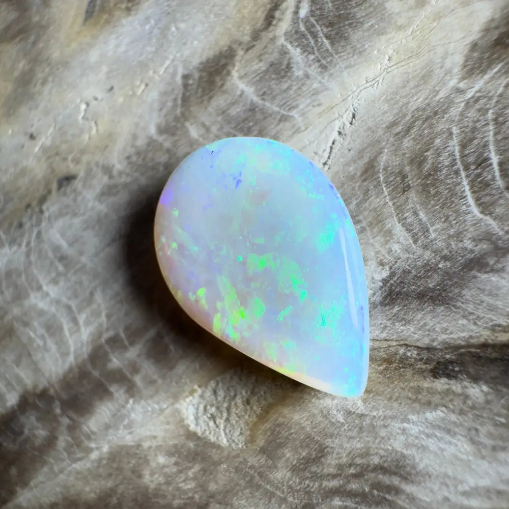 Iridescent teardrop-shaped opal.