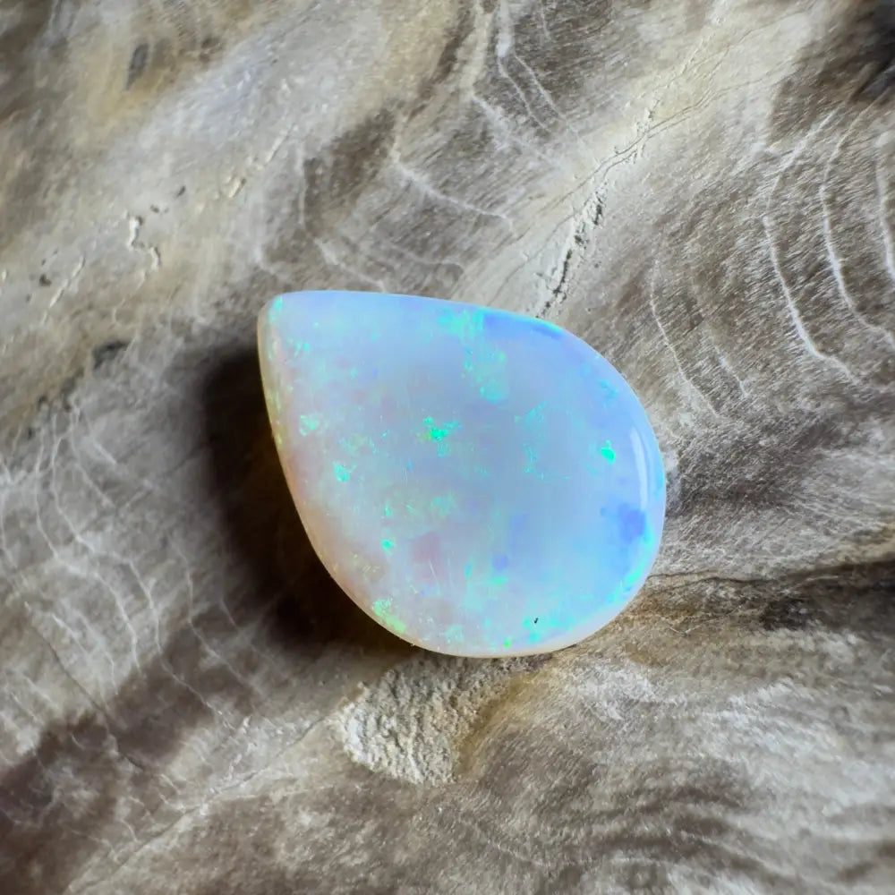 Iridescent teardrop-shaped opal.