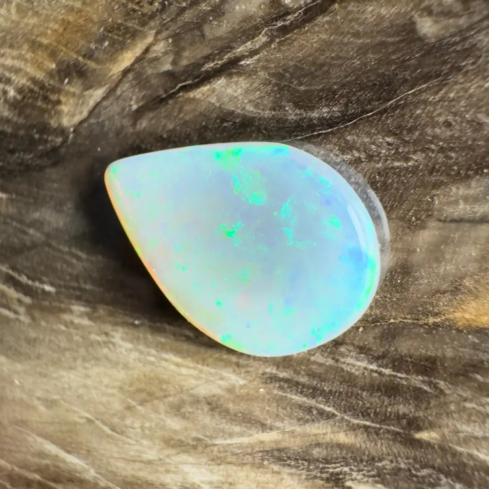 Iridescent teardrop-shaped opal.