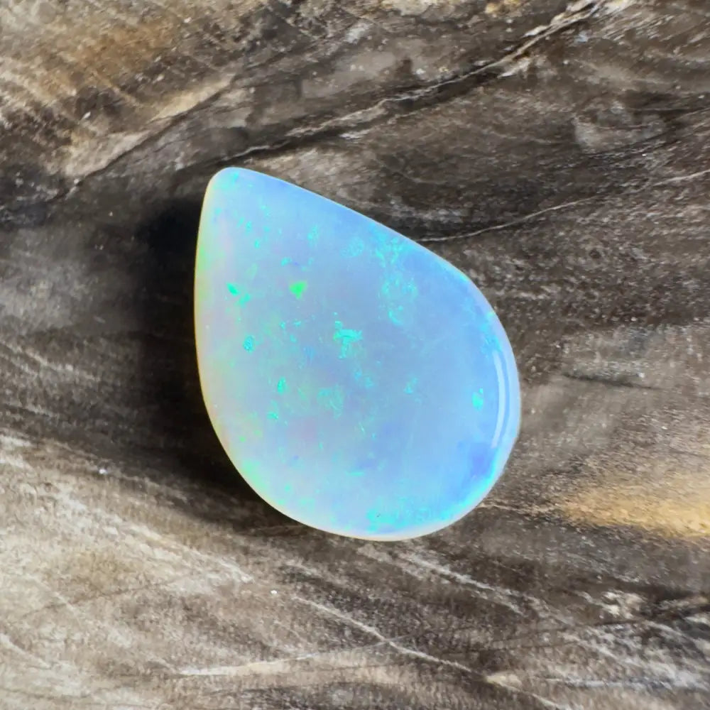 Iridescent teardrop-shaped opal.