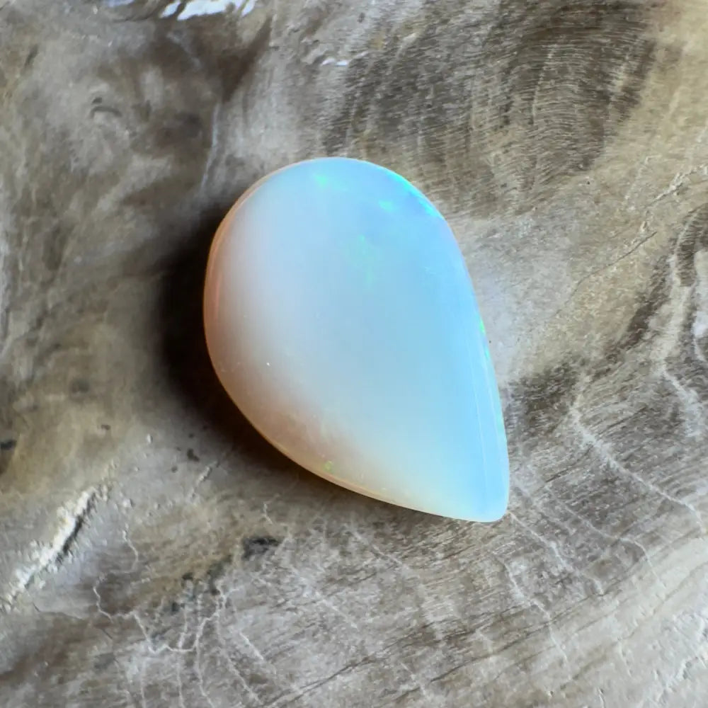 Iridescent, teardrop-shaped opal.