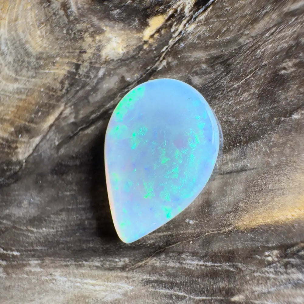 Iridescent teardrop-shaped opal.