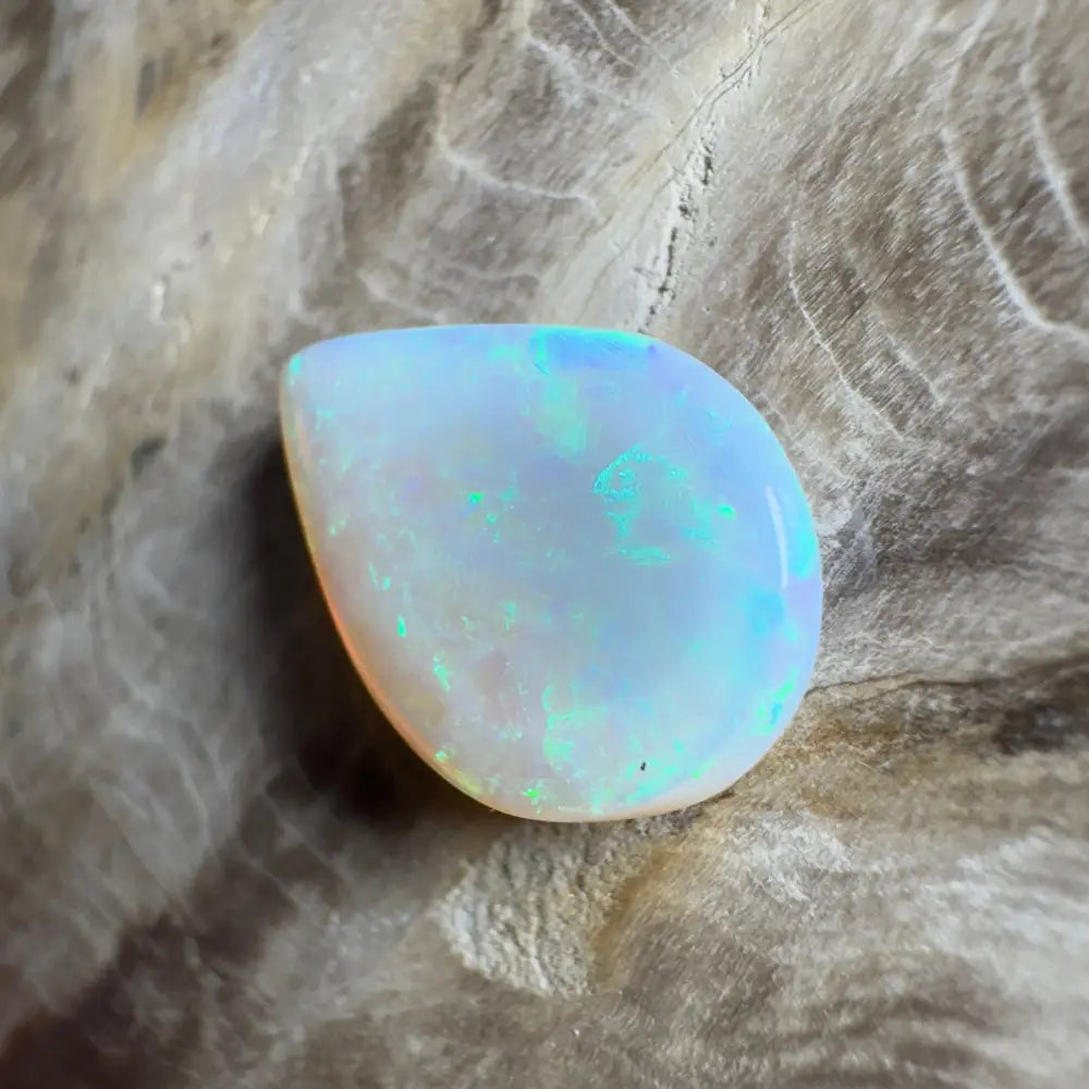 Iridescent teardrop-shaped opal.