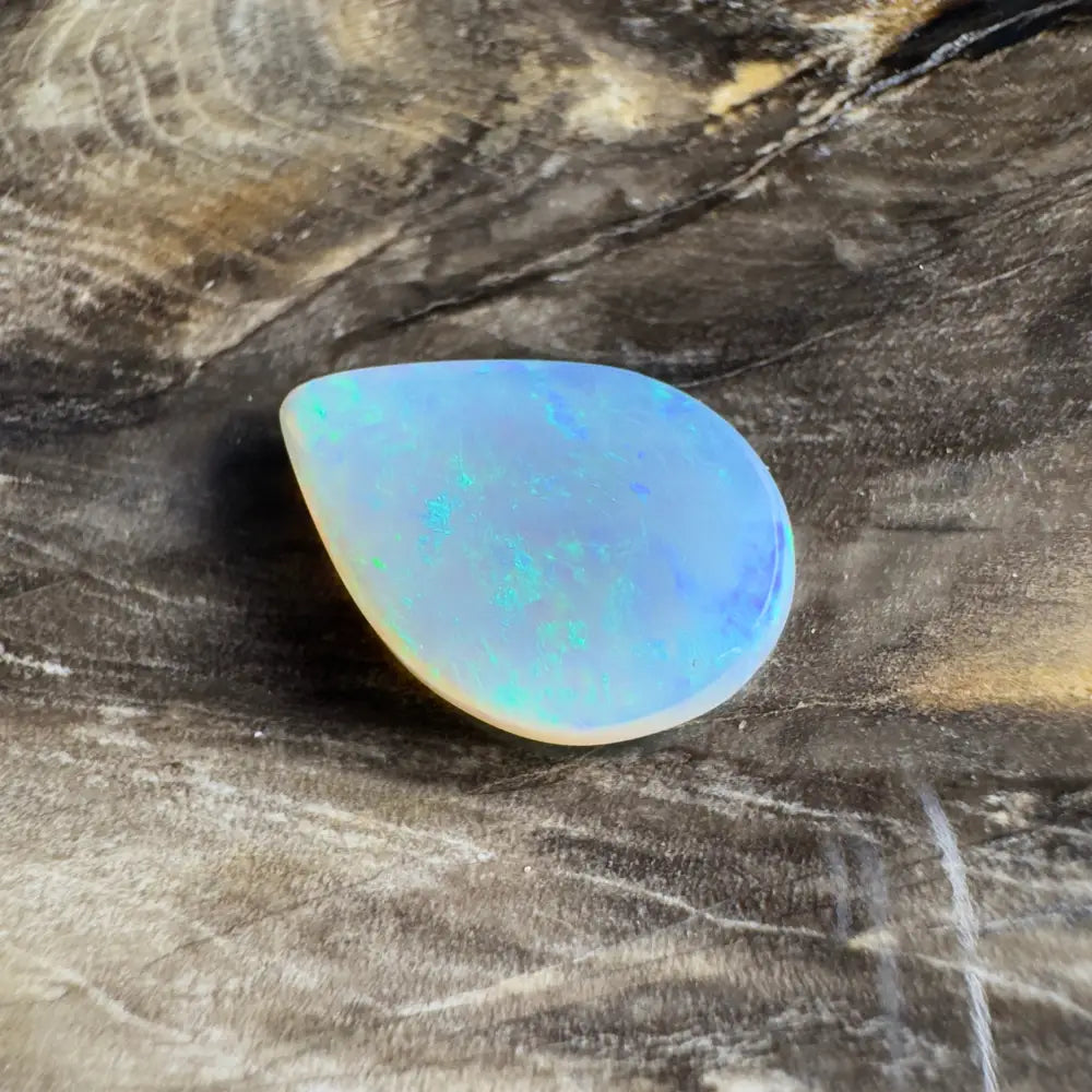Iridescent teardrop-shaped opal.