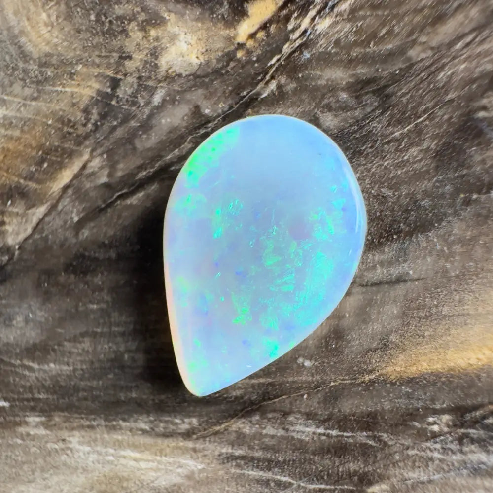 Iridescent teardrop-shaped opal.