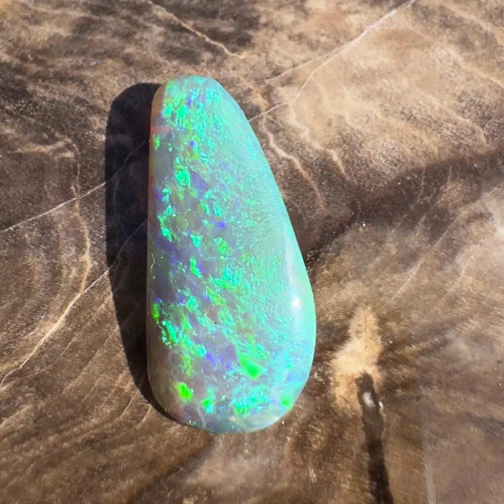 Iridescent, teardrop-shaped opal.
