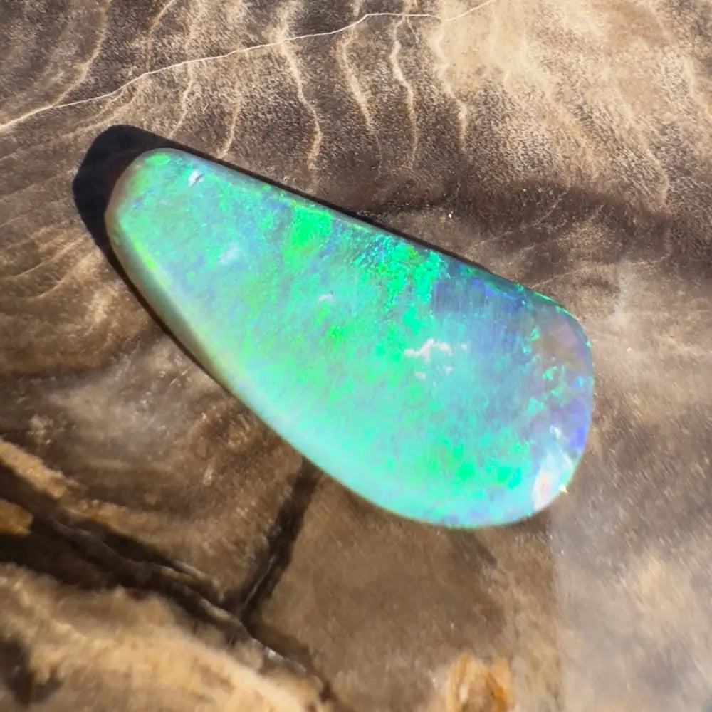 Iridescent green and blue opal.