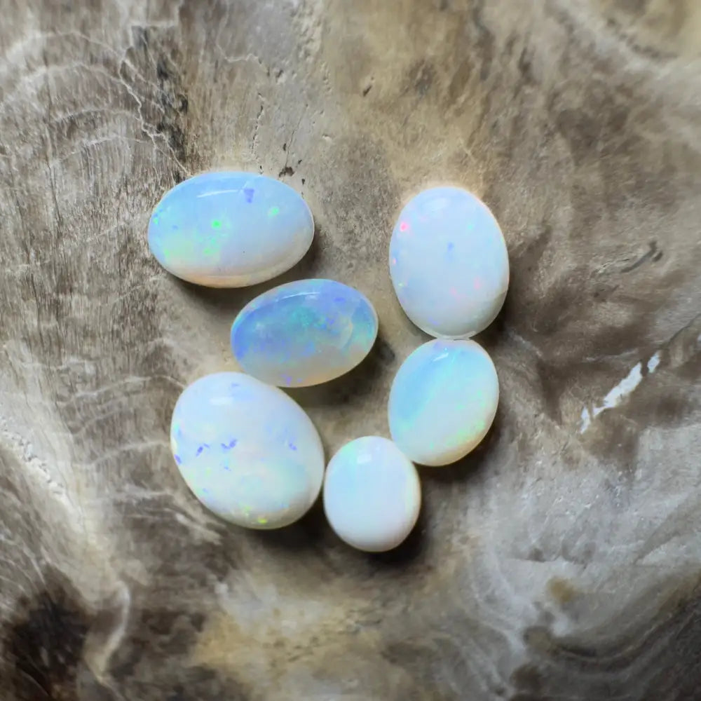 Iridescent oval opals.